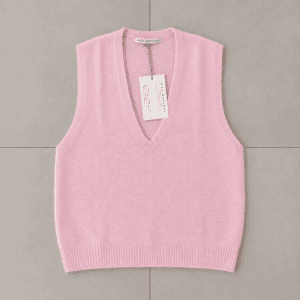 gilet rosa in maglia con etichetta inga marshan